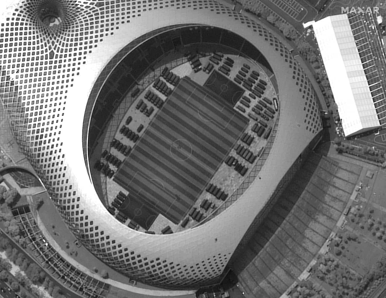 A satellite image captured on Monday appears to show Chinese security force vehicles in Shenzen.