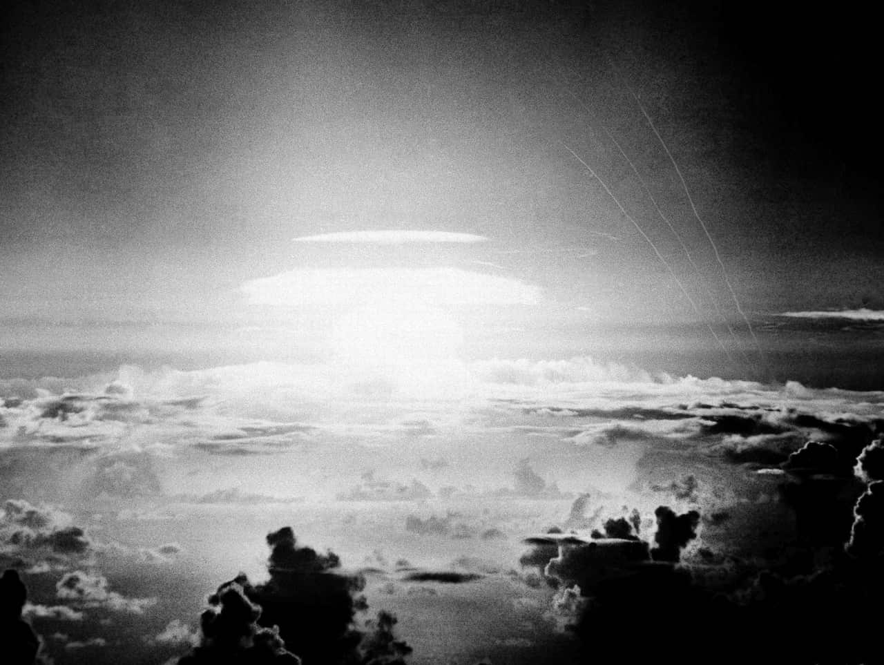 In this May 21, 1956, file photo, the fireball of a hydrogen bomb lights up the sky over Bikini Atoll in the Marshall Islands.