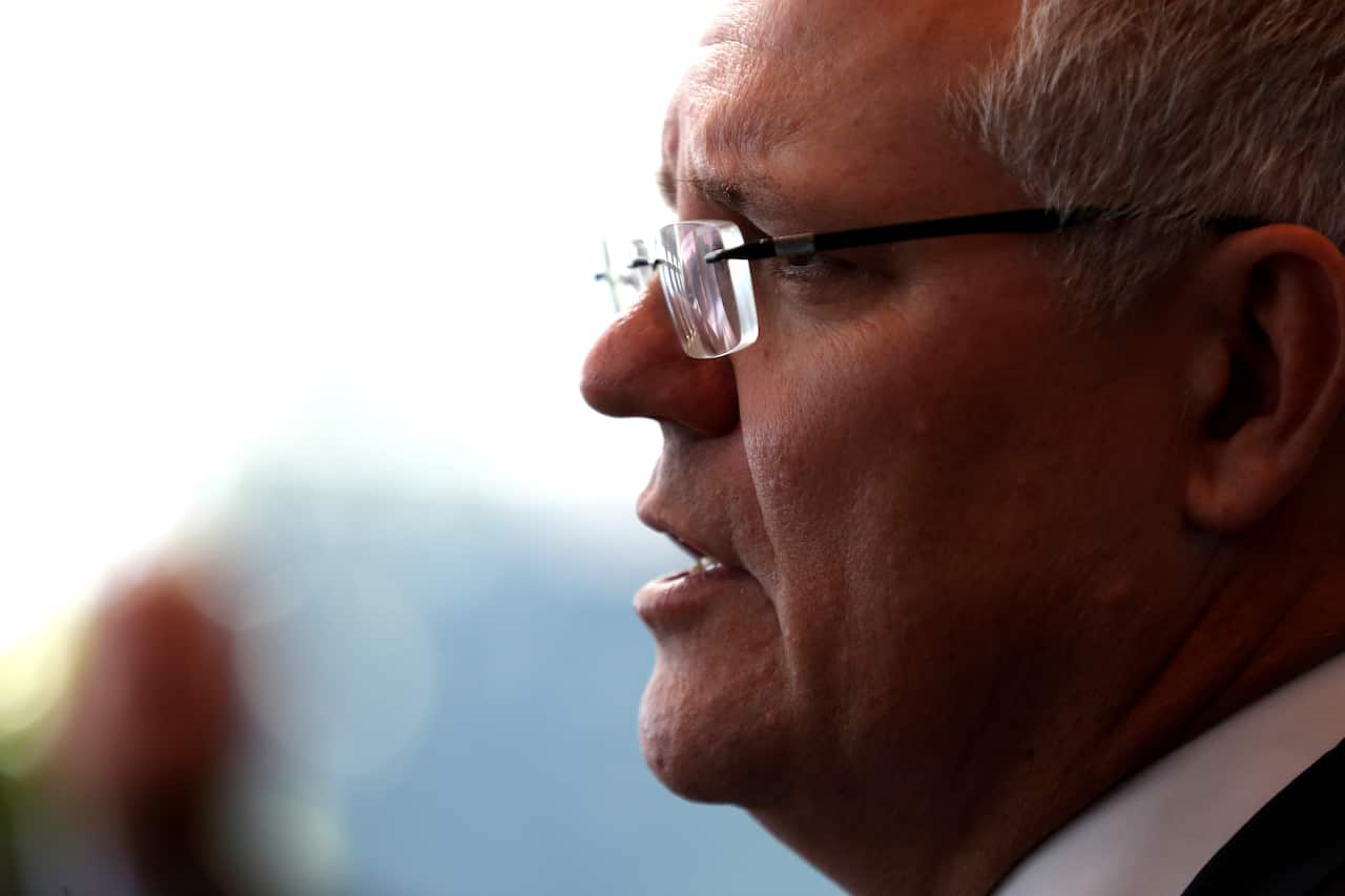 Prime Minister Scott Morrison speaks to the media at the South Australian Liberal party Annual General Meeting at the Adelaide Convention Centre in Adelaide, Saturday, August 17, 2019.  (AAP Image/Kelly Barnes) NO ARCHIVING