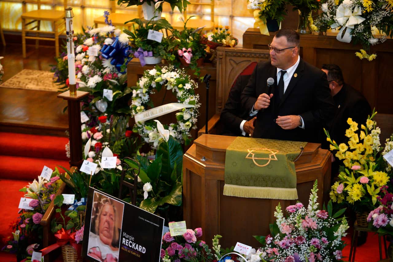 Dean Reckard, son of Margie Reckard, speaks about his mother's life during her funeral at La Paz Faith Memorial & Spiritual Center, Friday, Aug. 16, 2019, in El Paso, Texas. Reckard was killed during the mass shooting on Aug. 3.(AP Photo/Jorge Salgado)