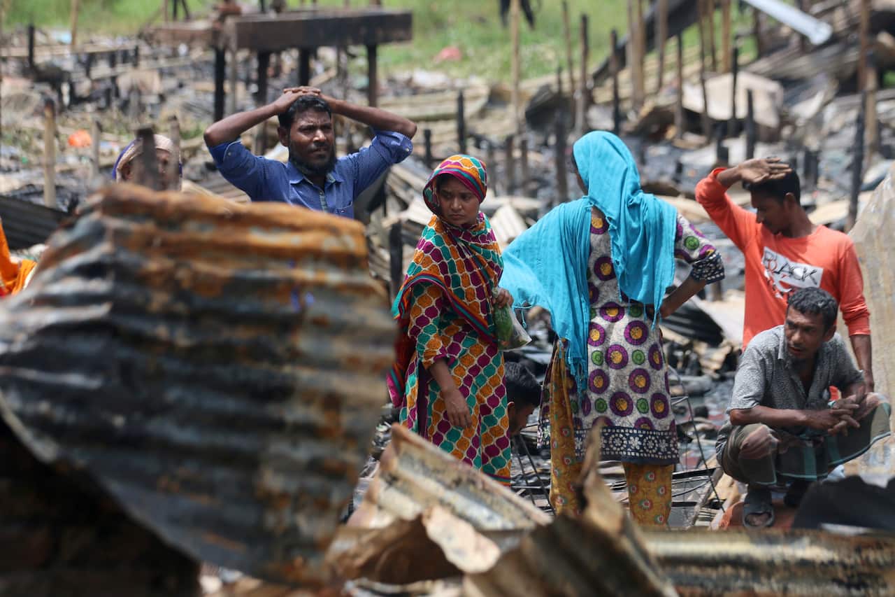 Dwellers at the fire devastated slum in Mirpur area of Dhaka.3,000 families have been affected by the massive fire in Mirpur 7 at the Jhilpar slum. (Photo by Sultan Mahmud Mukut / SOPA Images/Sipa USA) .