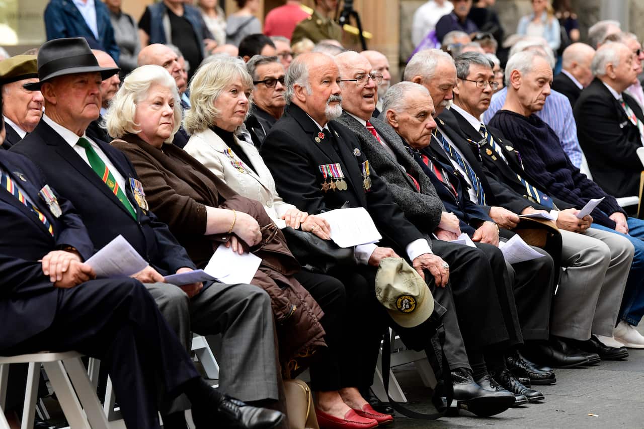 Australian war veterans and family members are seen during  the Vietnam Veterans  Memorial Day Service at the Cenotaph.