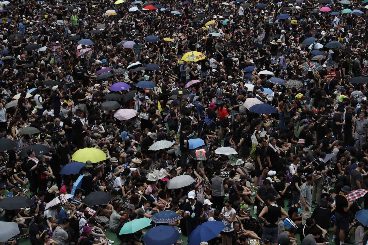 Protesters take part in an anti-government rally in Victoria Park.
