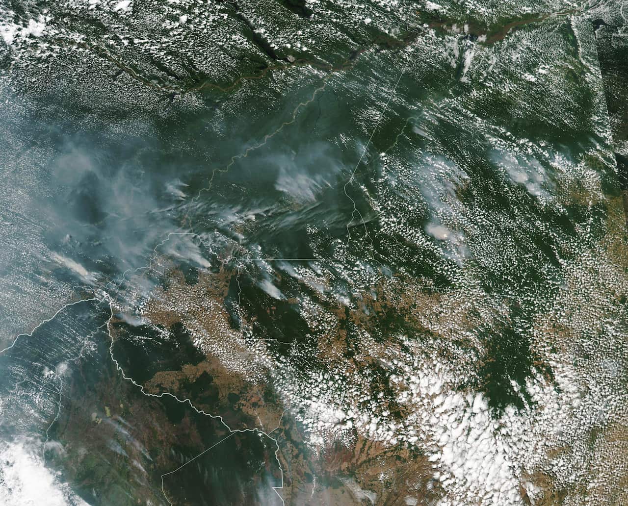 This satellite image provided by NASA in August shows several fires burning in the Brazilian Amazon forest. 