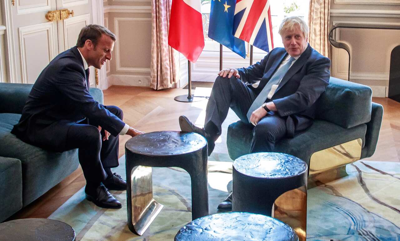 French President Emmanuel Macron and British Prime Minister Boris Johnson during their meeting at the Elysee Palace in Paris, France.