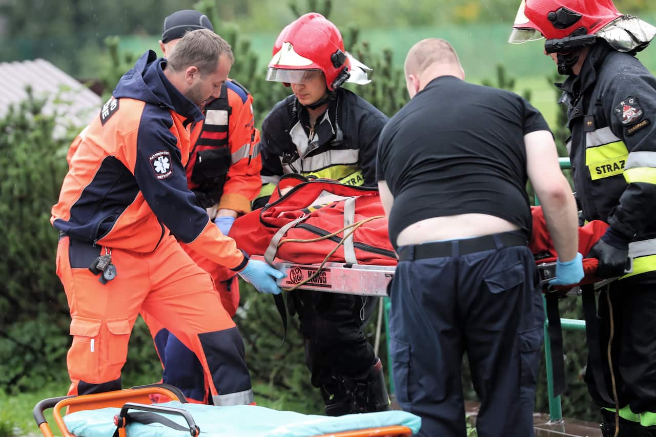 An injured tourist is transported to the hospital in Zakopane, Poland.