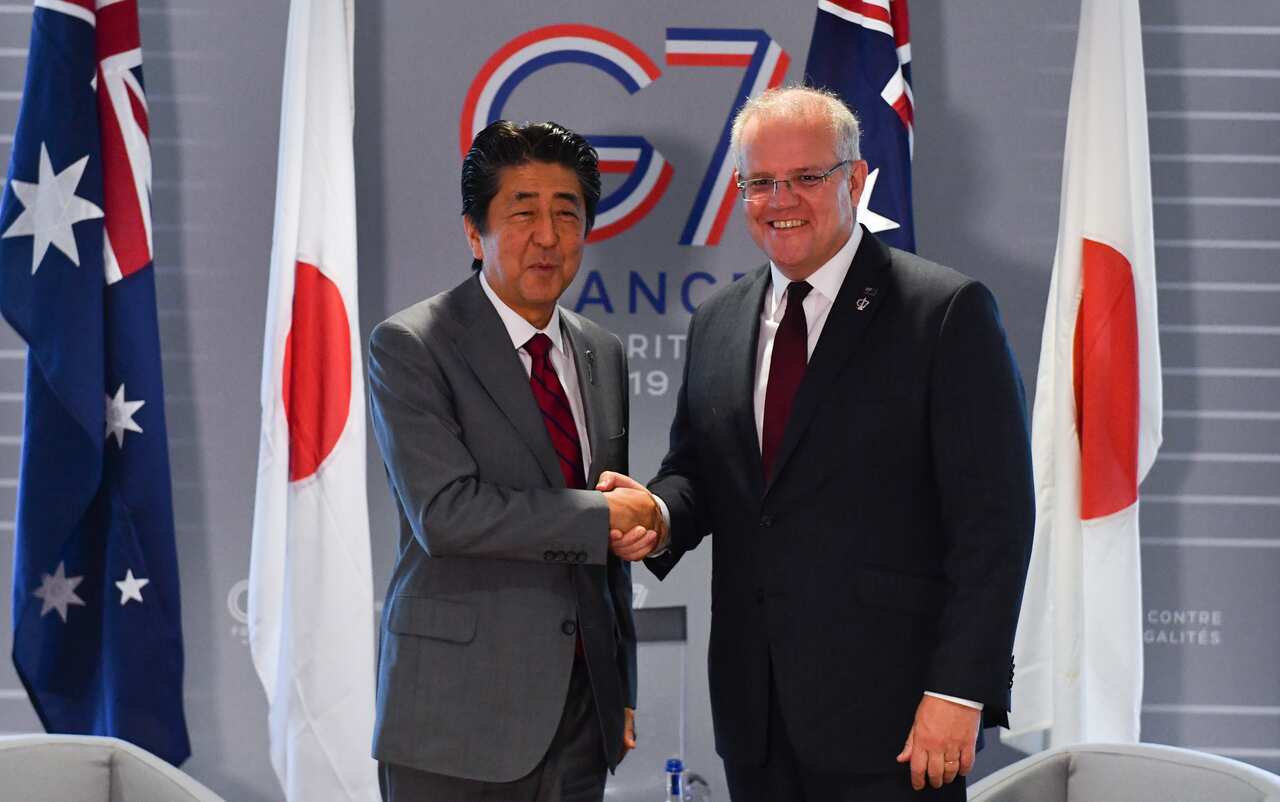 Shinzo Abe with Prime Minister Scott Morrison during the 2019 G7 Summit in France.