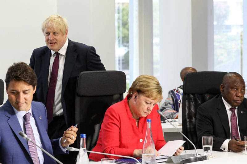 Representatives, including German Chancellor Angela Merkel and British Prime Minister Boris Johnson, at the G7 summit.