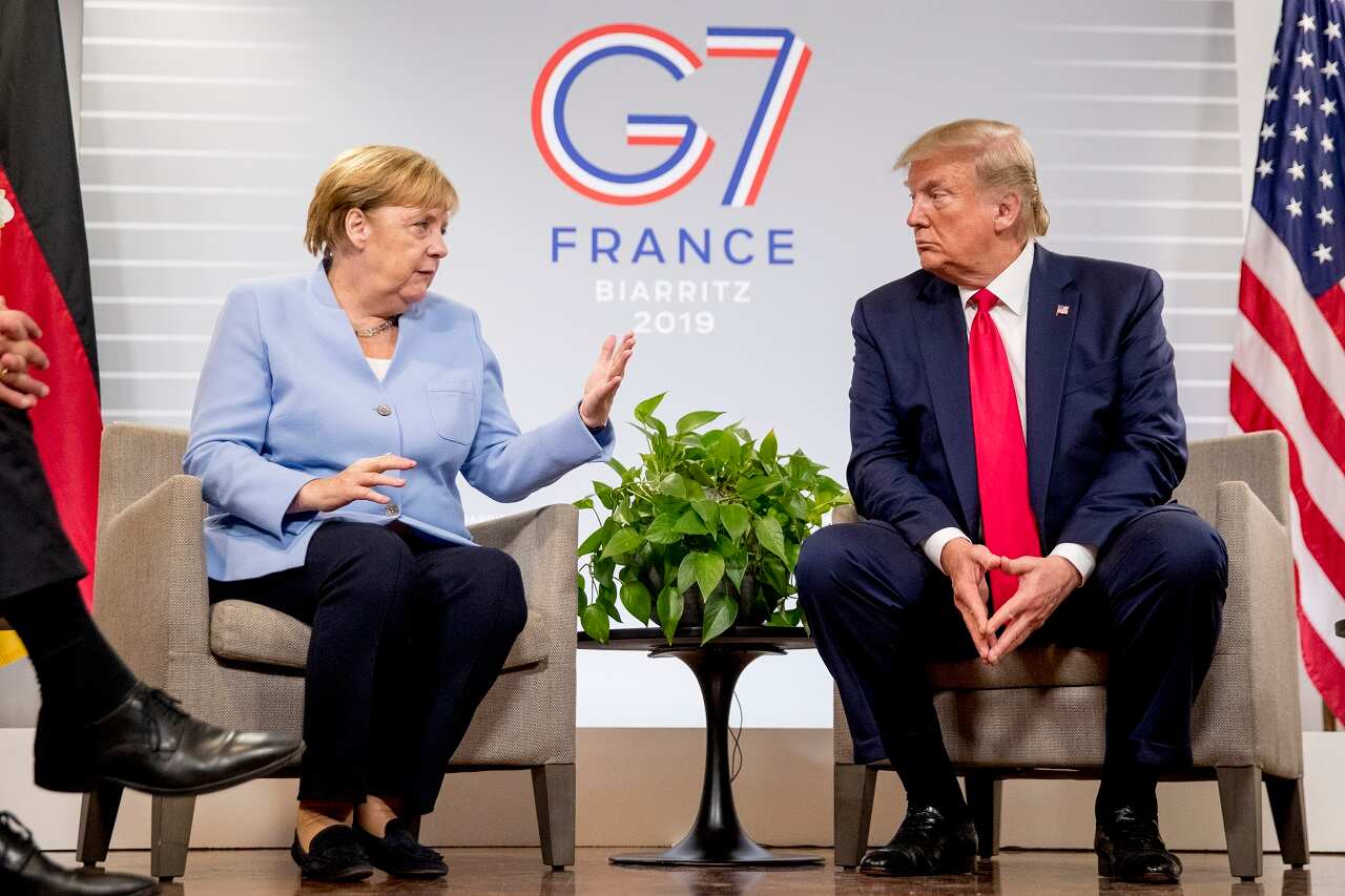 Donald Trump and Angela Merkel.