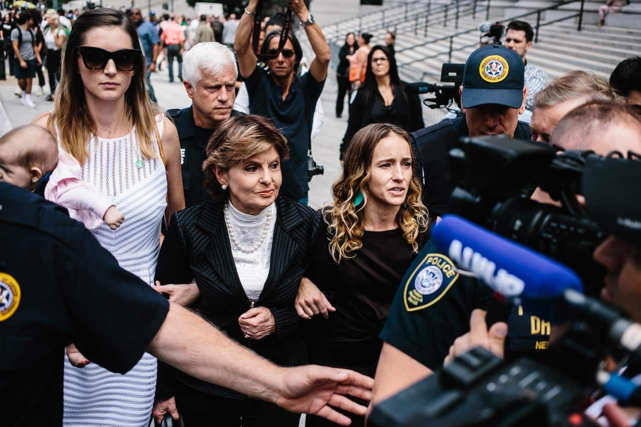 Teala Davies (right), one of Jeffrey Epstein's alleged victims, attorney Gloria Allred (centre), and another unidentified alleged victim.