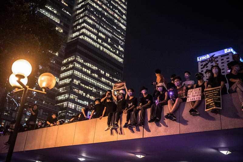 Protesters attend a '#MeToo' rally at Chater Garden, in Hong Kong.