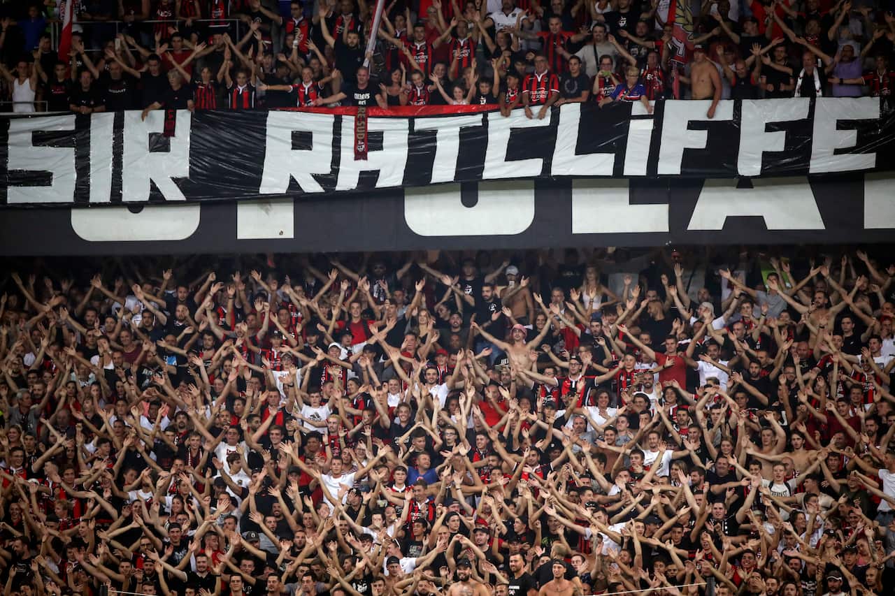 Nice soccer fans cheer beneath a banner that reads "Sir Ratcliffe" during the French League One soccer match.