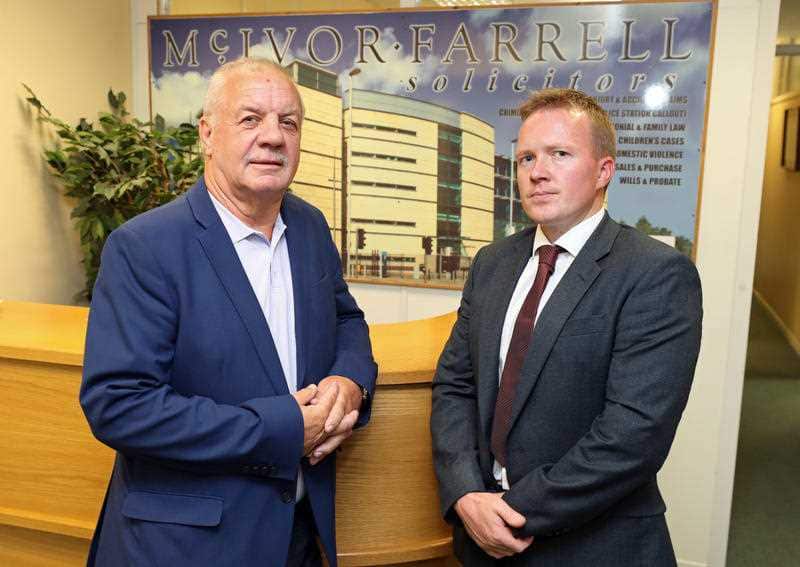 Raymond McCord (left) and his solicitor Ciaran O'hare at his office in Belfast.
