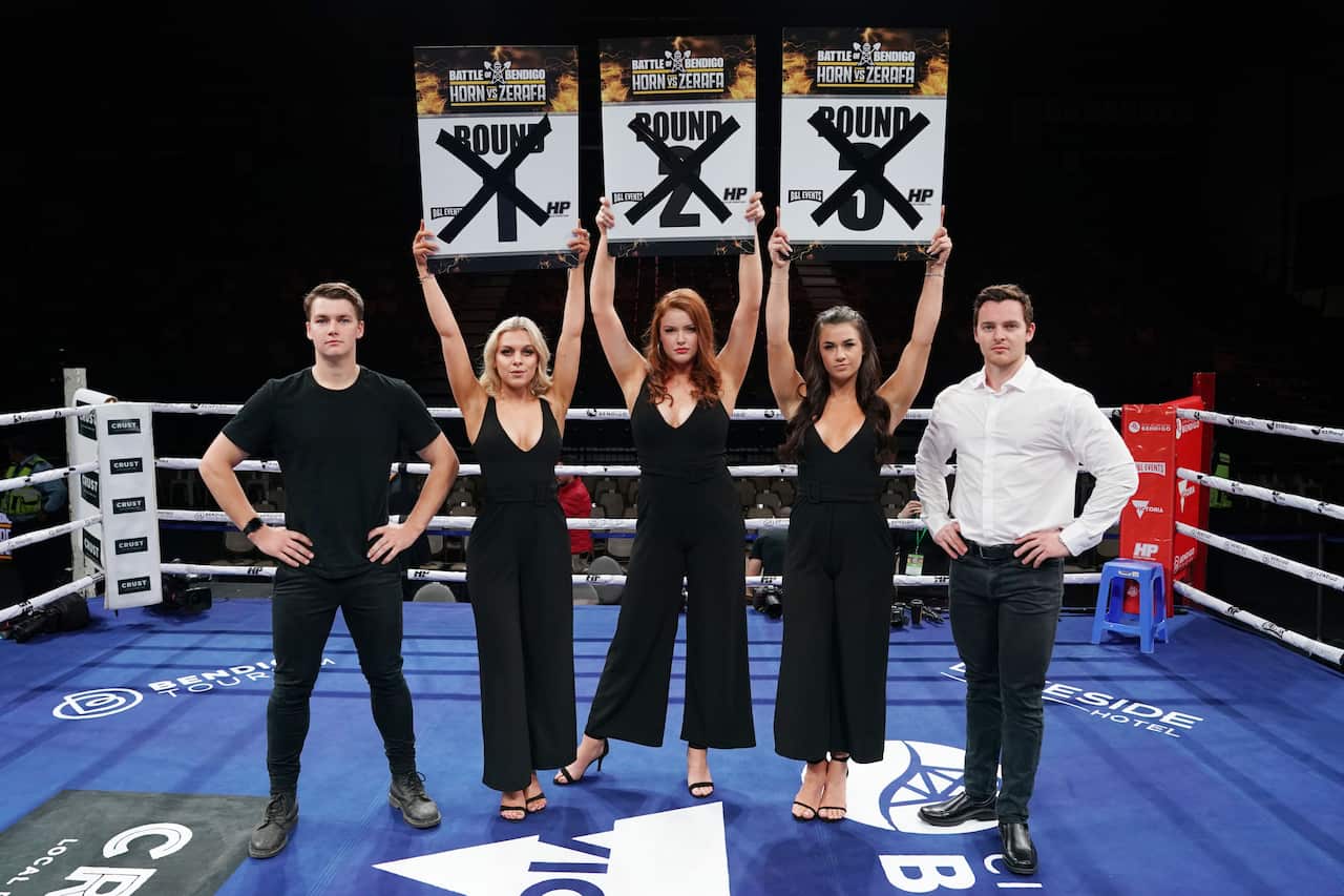 Fight Progress Managers pose for a photograph after being told they won't be walking the ring between rounds ahead of the 'Battle of Bendigo'.