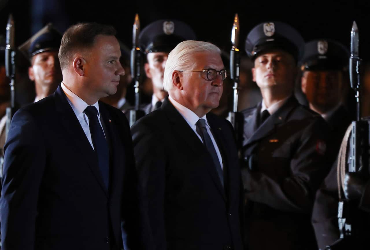 German President Frank-Walter Steinmeier, right, and Polish President Andrzej Duda, left, attend ceremony marking the 80th anniversary of World War II.