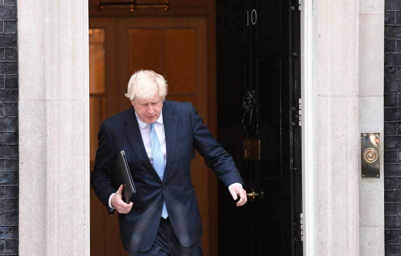 British Prime Minister, Boris Johnson arrives to deliver a statement outside 10 Downing street in Westminster, central London