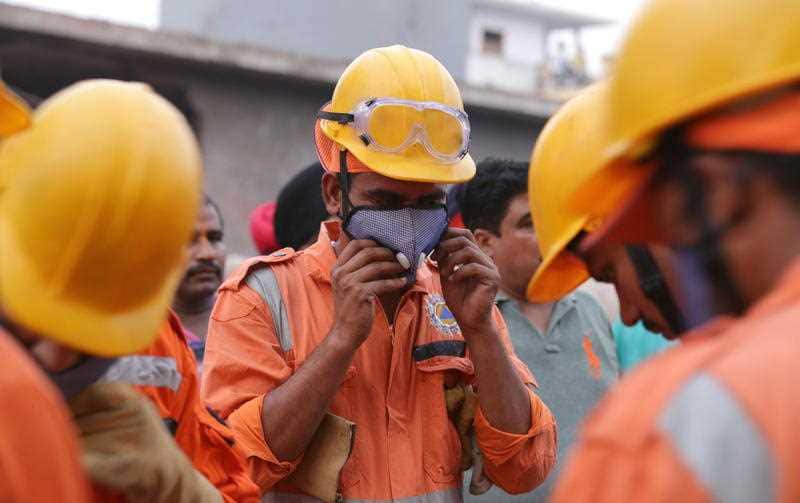National Disaster Response Force (NDRF) personnel get ready to engage in rescue work