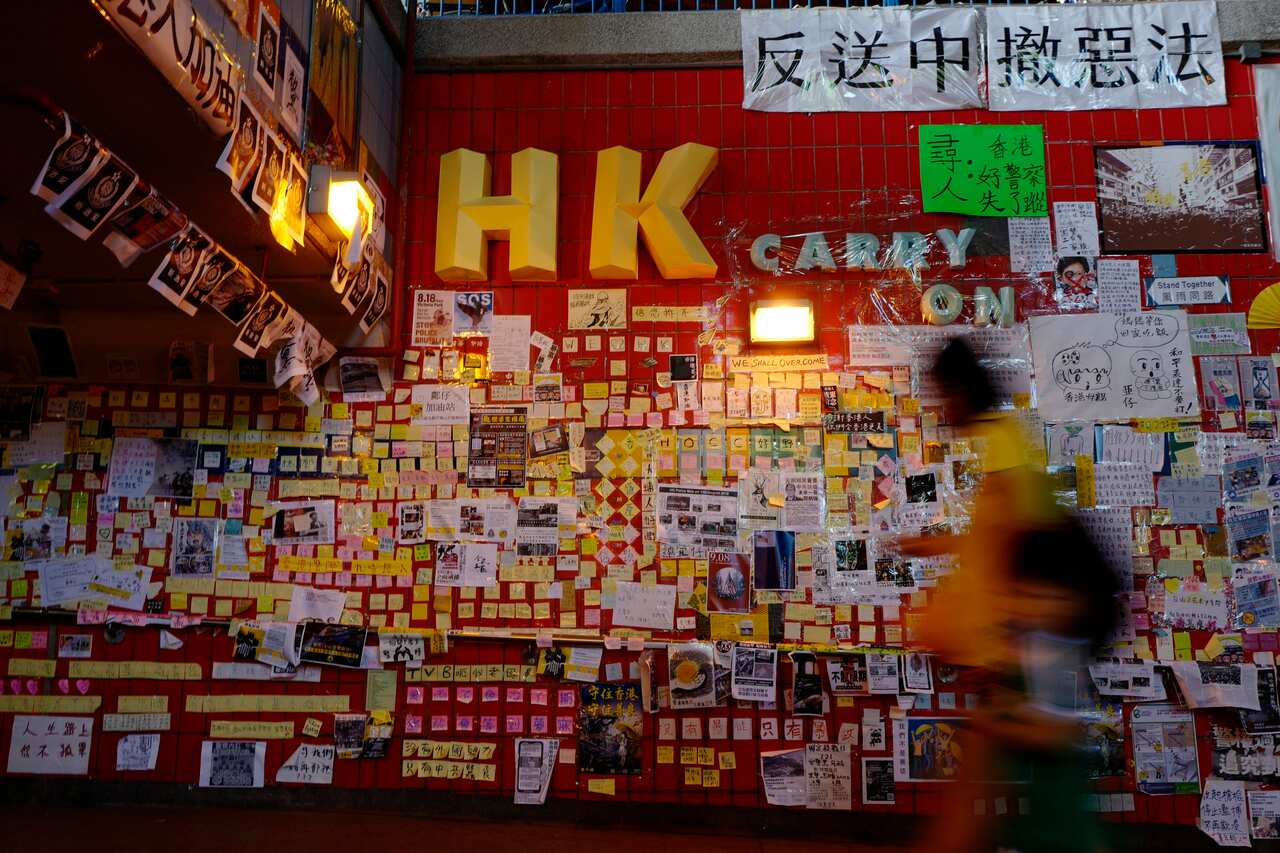 A pro-Beijing politician has called on China supporters to pull down Lennon Walls in Hong Kong. 