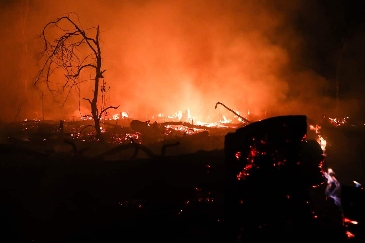 A fire burns in a in Porto Velho, Brazil.