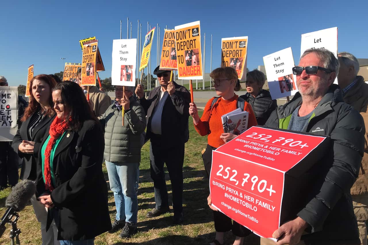 Supporters of the Biloela Tamil family deliver a petition to Prime Minister Scott Morrison at Parliament House.