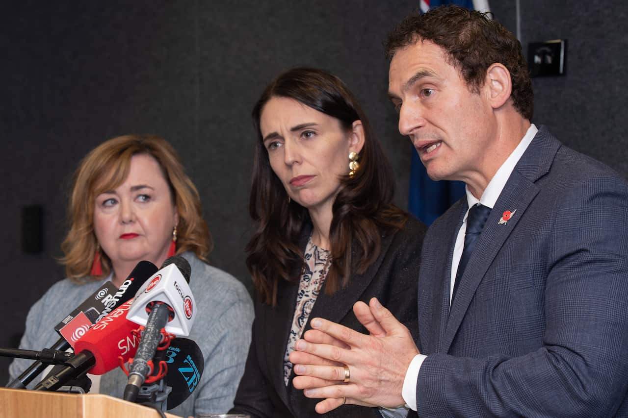 Minister of Police Stuart Nash speaks to the media alongside Jacinda Ardern (centre) and Minister for Christchurch Regeneration Megan Woods.