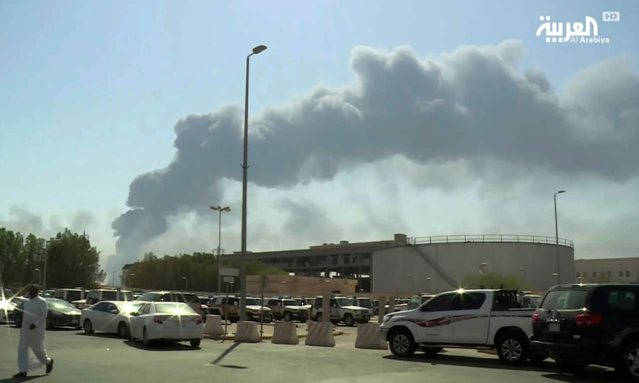 Smoke from a fire at the Abqaiq oil processing facility fills the skyline. 
