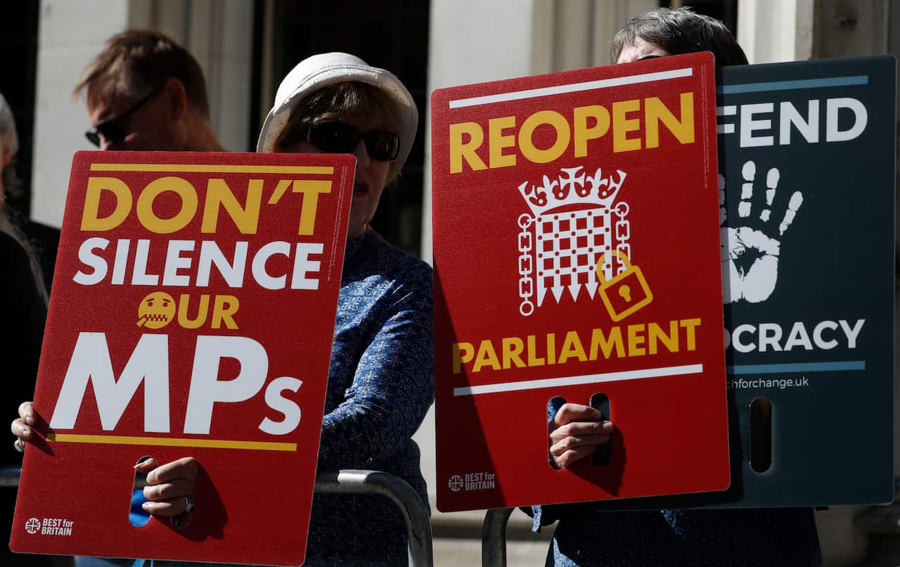 Anti-Brexit protestors demonstrate outside The Supreme Court in London on Tuesday. 