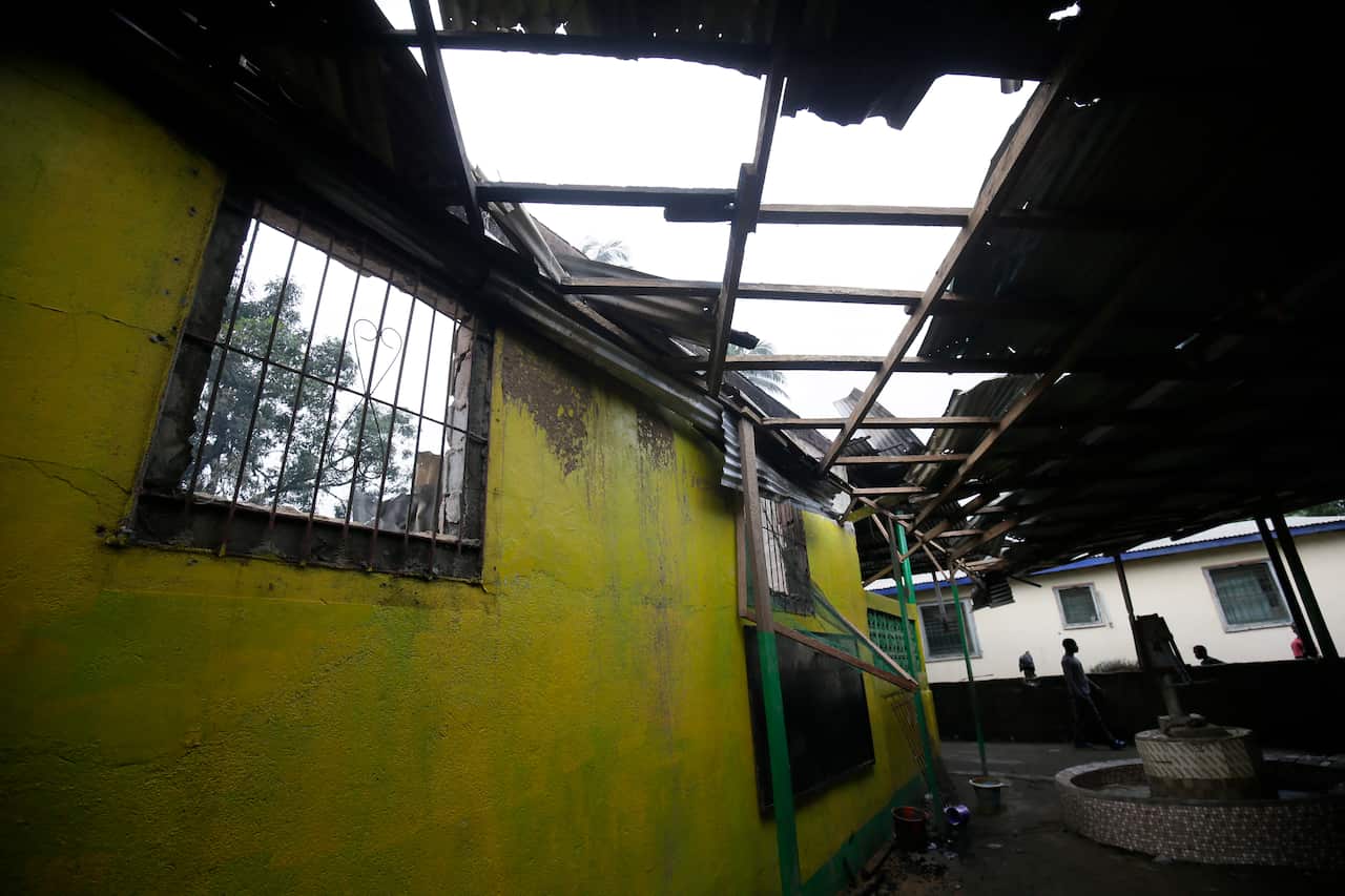 A view of the aftermath of a fire inside an Islamic boarding school (Madrasa), in Paynesville, outside Monrovia.
