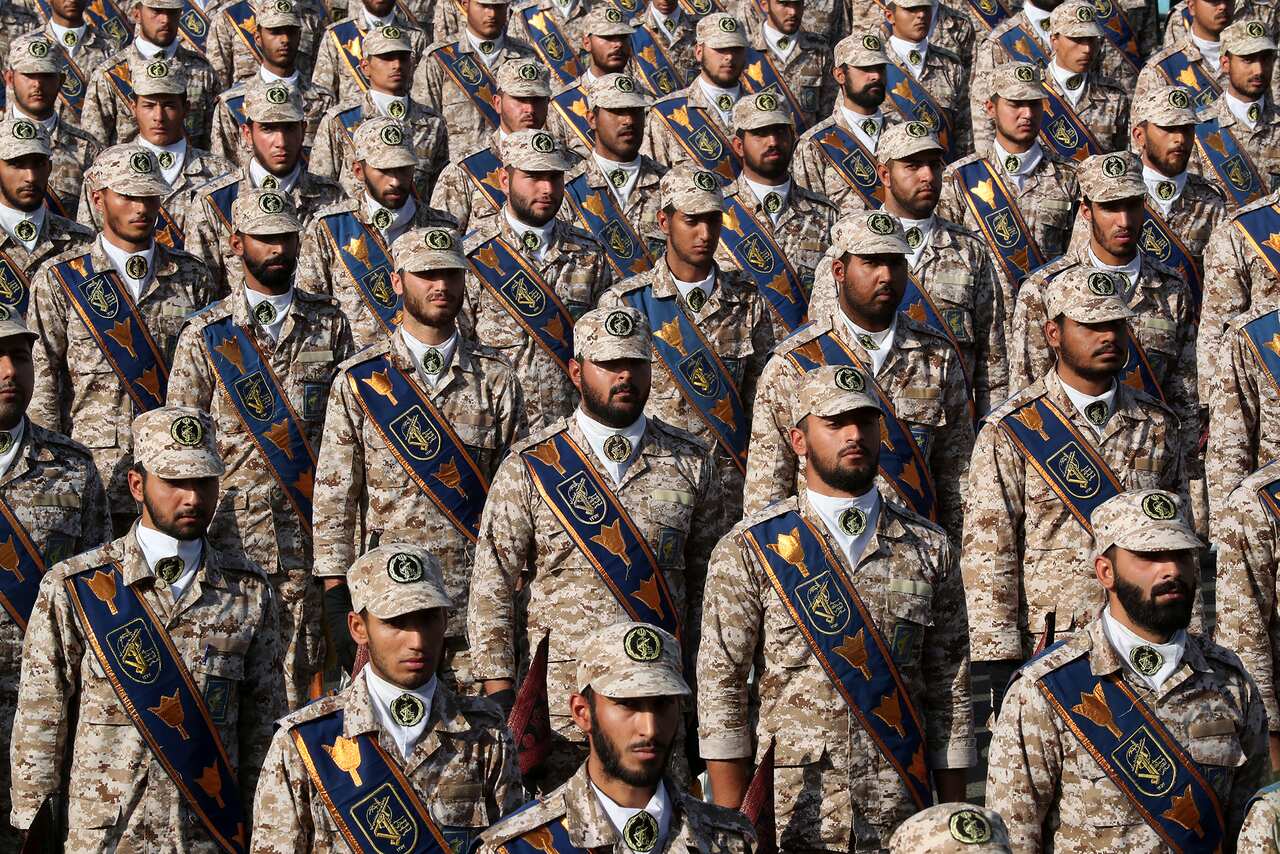 Revolutionary Guard troops attend a military parade marking 39th anniversary of outset of Iran-Iraq war.