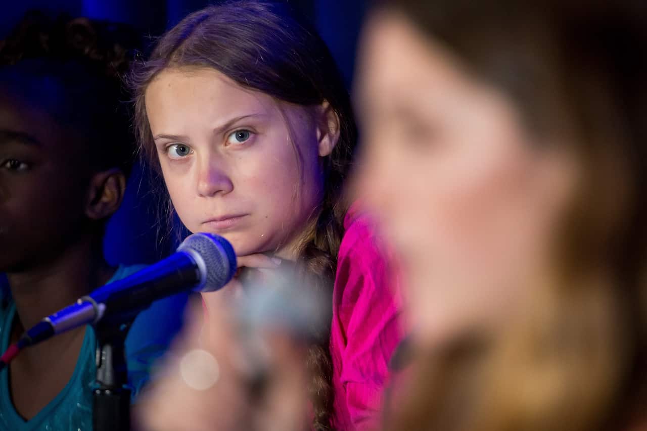 Greta Thunberg listens to a speaker as she and 15 other children from across the world present an official human rights complaint on the climate crisis.