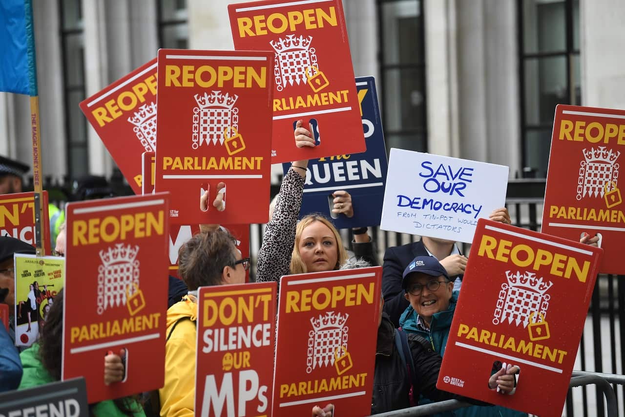 Protesters outside the Supreme Court on Tuesday.