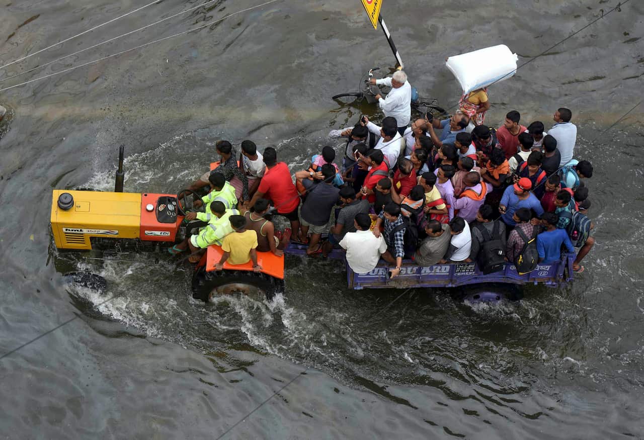 Rescue groups save people from flooded areas in Rajendra Nagar following heavy rainfall in Patna.