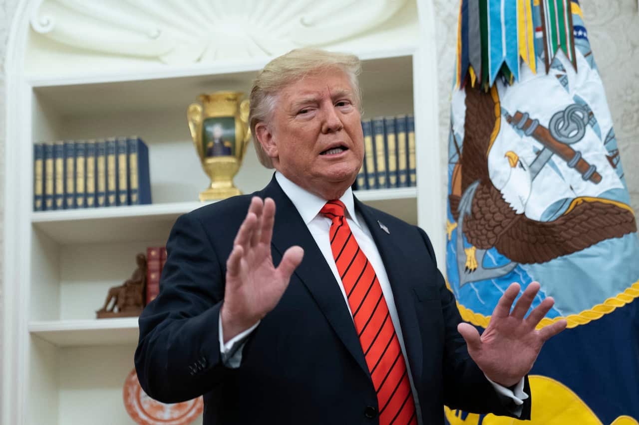 United States President Donald J. Trump speaks to the media after participating in the Ceremonial Swearing-In of Gene Scalia as the Secretary of Labor at the White House, September 30, 2019. Credit: Chris Kleponis / Pool via CNP.