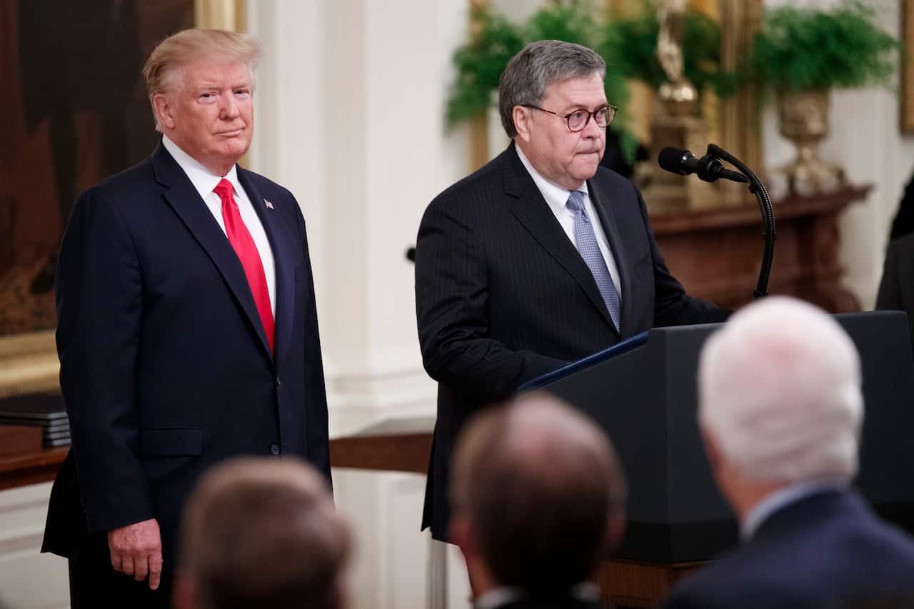 US Attorney General William Barr with US President Donald Trump.