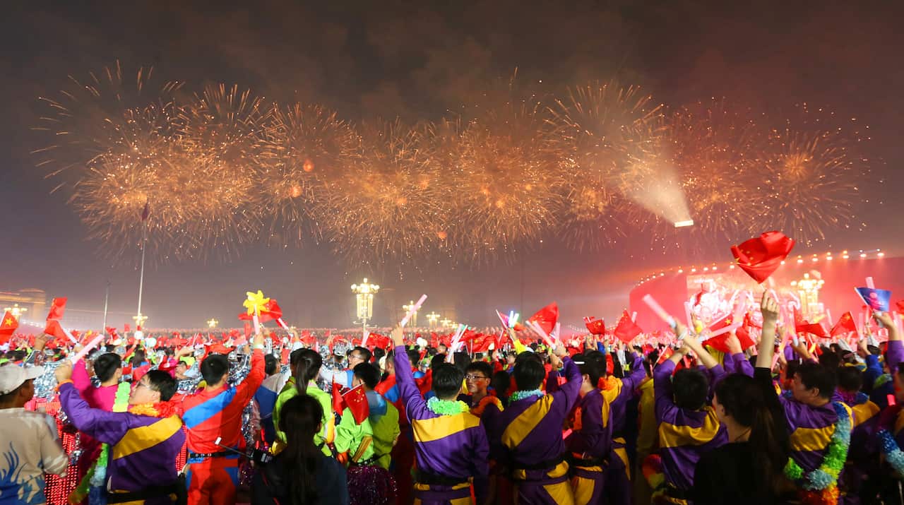 A night show to celebrate the 70th anniversary of the founding of a nation is held at the Tiananmen Square in Beijing, China on October 1, 2019. New weapons were unveiled at the largest military parade ever. ( The Yomiuri Shimbun via AP Images )
