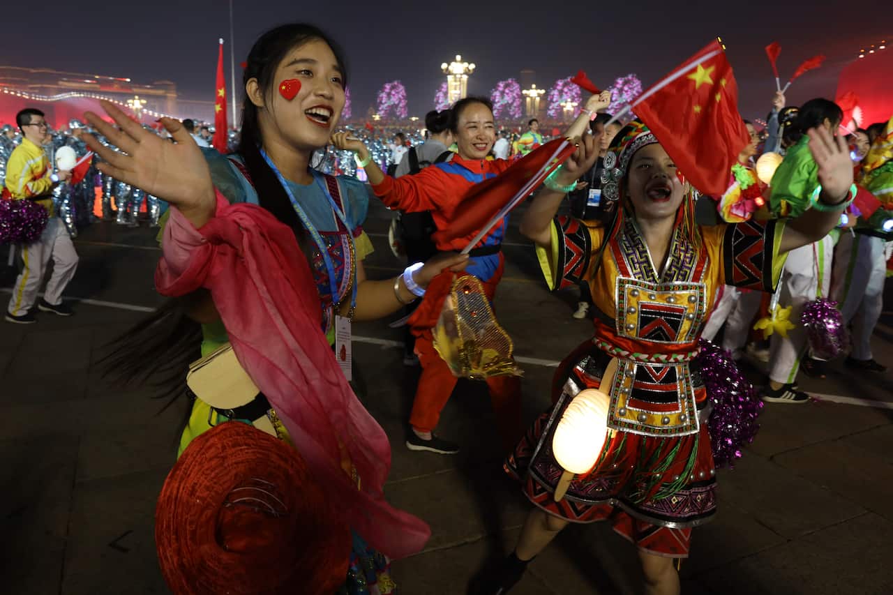 Dancers celebrate in Tienanmen Square.
