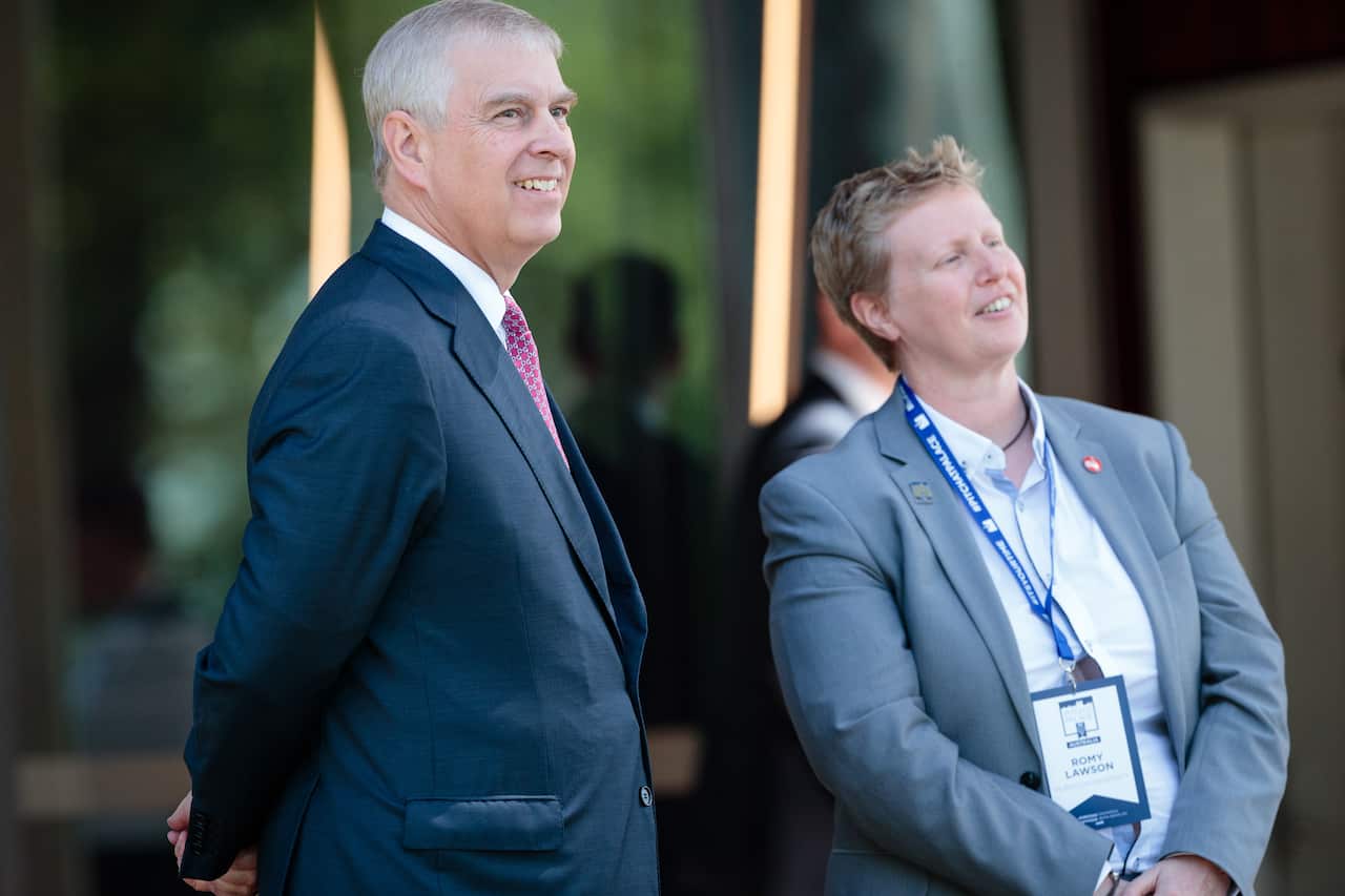 Prince Andrew, Duke of York is met by the provost of Murdoch University Professor Romy Lawson (right) on arrival at Murdoch University in Perth, Wednesday, October 2, 2019. (AAP Image/Richard Wainwright) NO ARCHIVING