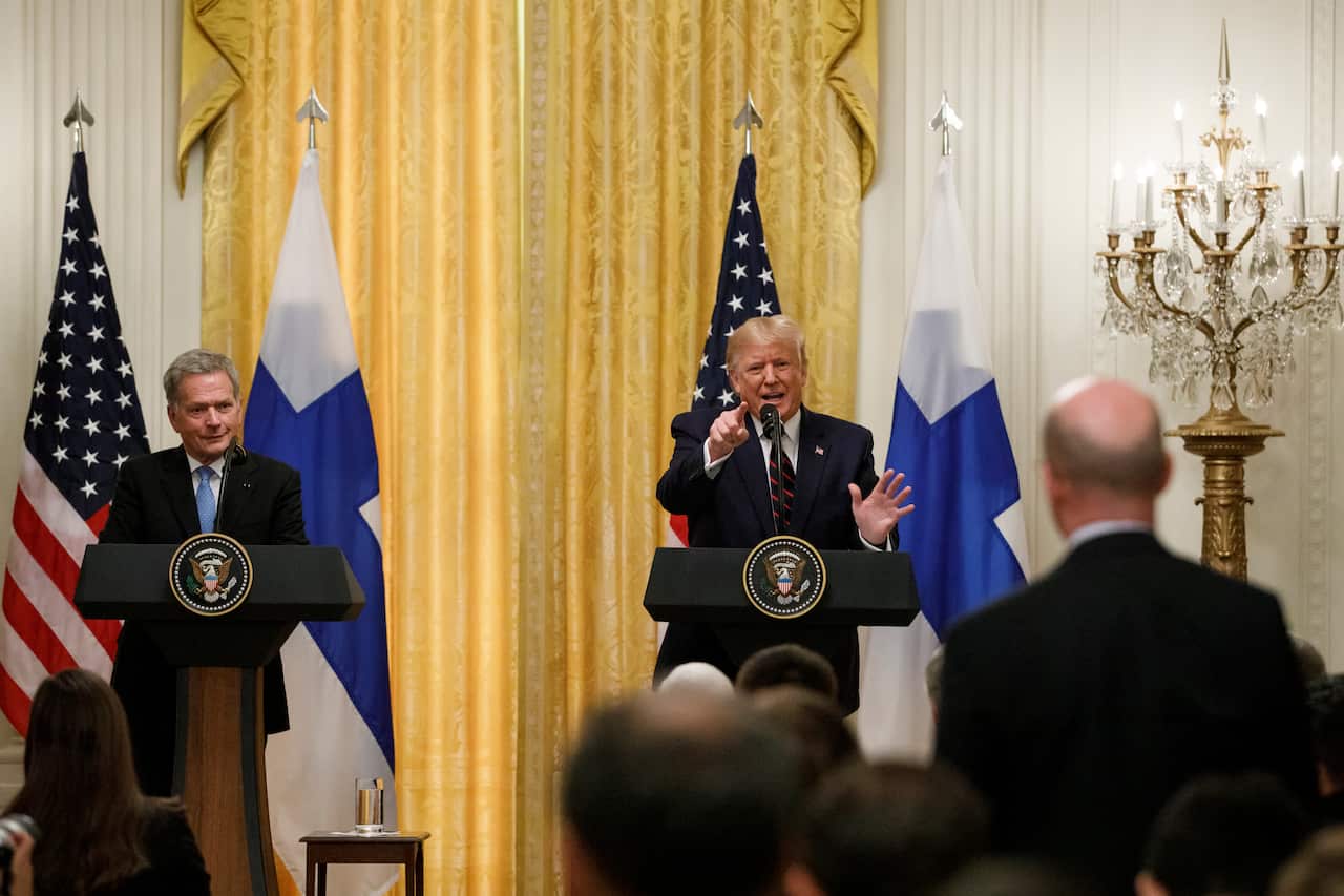 President Donald Trump, joined by Finnish President Sauli Niinisto, speaks during a news conference at the White House in Washington, Wednesday, Oct. 2, 2019. (AP Photo/Carolyn Kaster)
