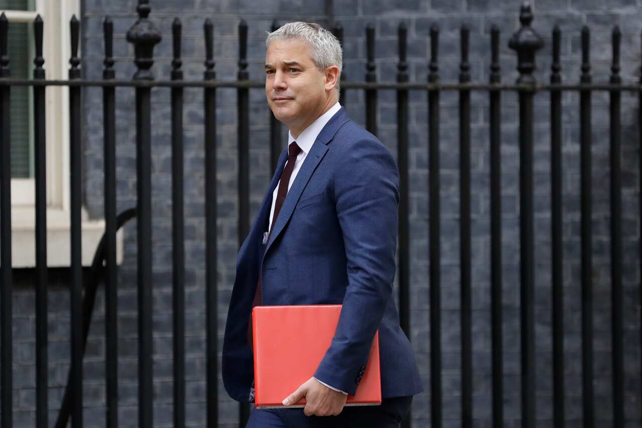 Britain's Brexit Secretary Stephen Barclay arrives for a cabinet meeting at Downing Street in London, Thursday, Oct. 3, 2019. 