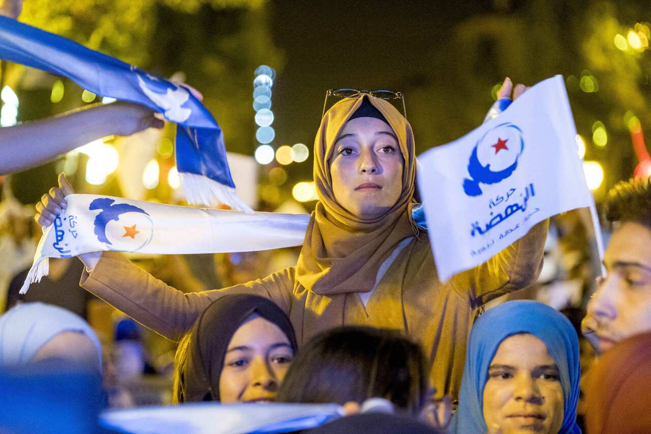 Supporters of Ennahda Movement are seen during a gathering within an election campaign at Habib Burgiba Street ahead of Tunisia's presidential election in Tunis, Tunisia on October 4, 2019. Photo by Nicolas Fauque/Images de Tunisie/ABACAPRESS.COM.