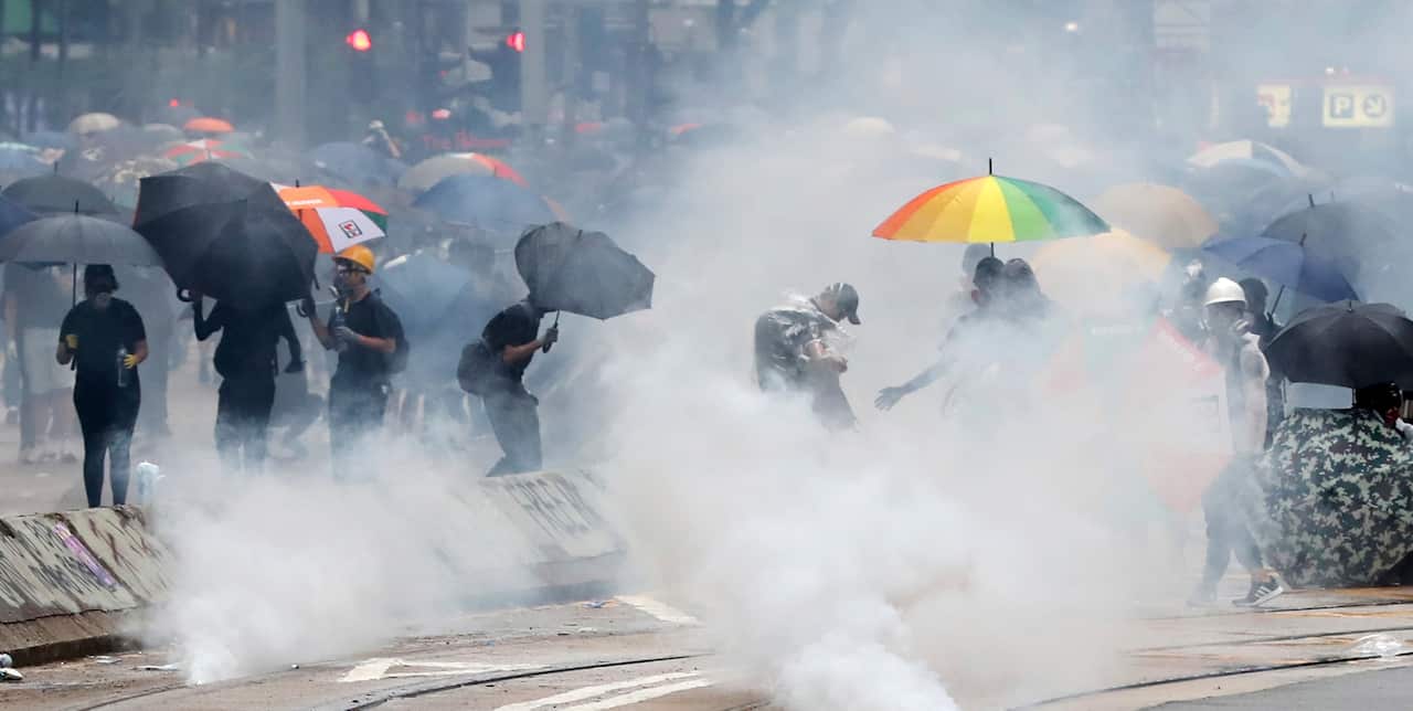 Protesters receive tear bomb shot by police during a demonstrationin Hong Kong on Oct. 6, 2019. ( The Yomiuri Shimbun via AP Images )