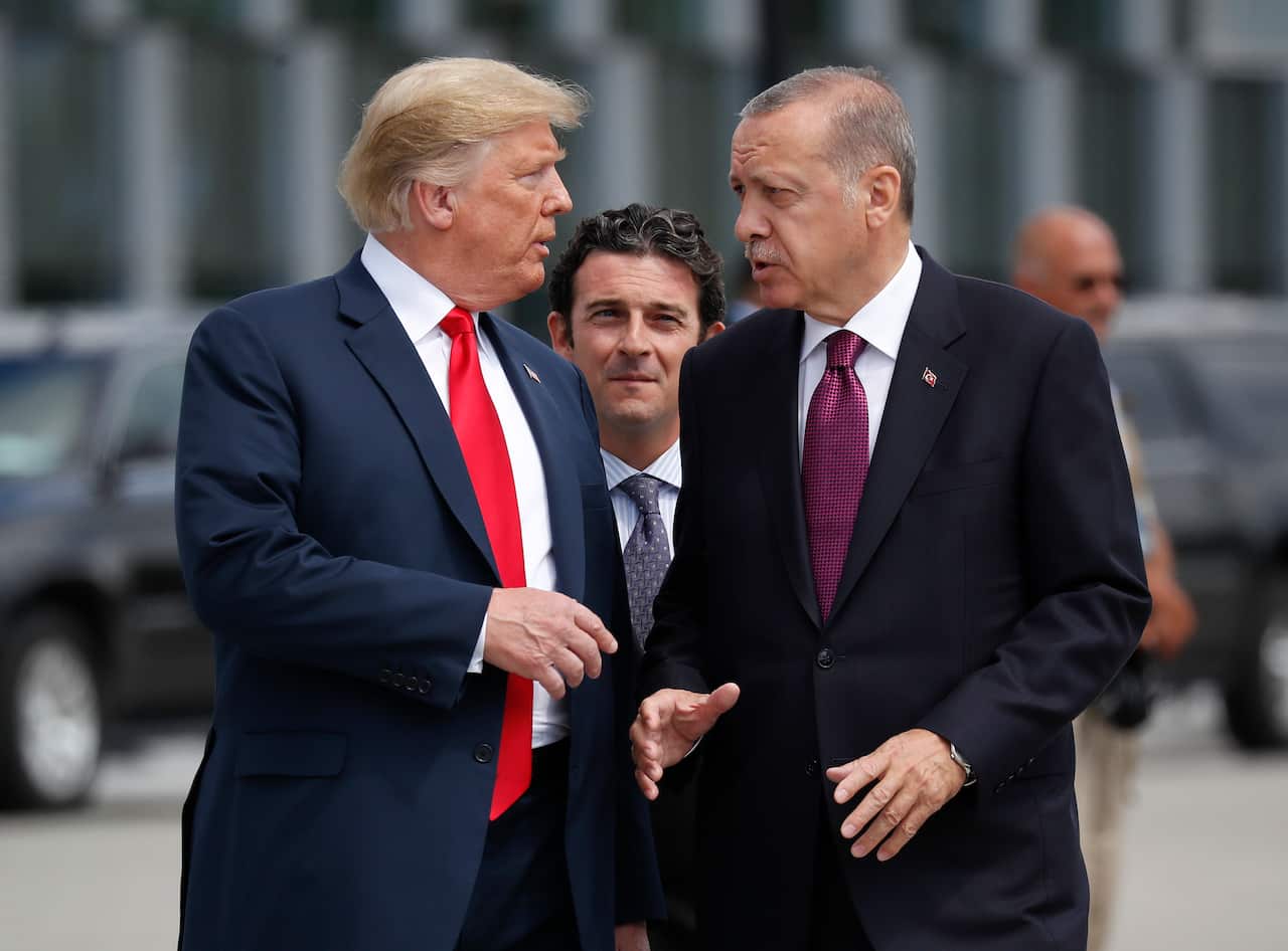 US President Donald Trump, left, talks with Turkey's President Recep Tayyip Erdogan.