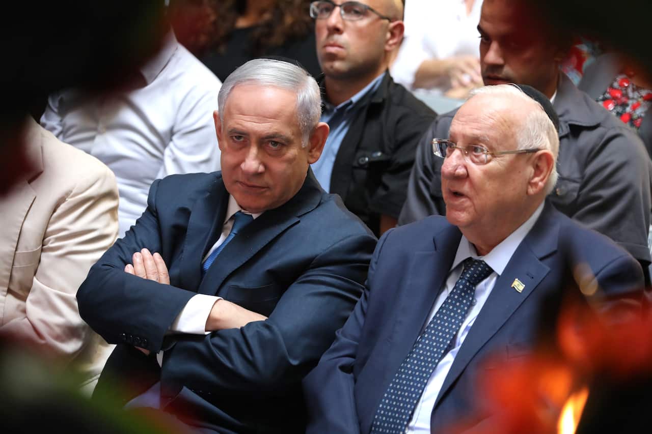 Israeli Prime Minister Benjamin Netanyahu (left) and Israeli President Reuven Rivlin. Mr Rivlin says he will ask Gantz to try to form government.