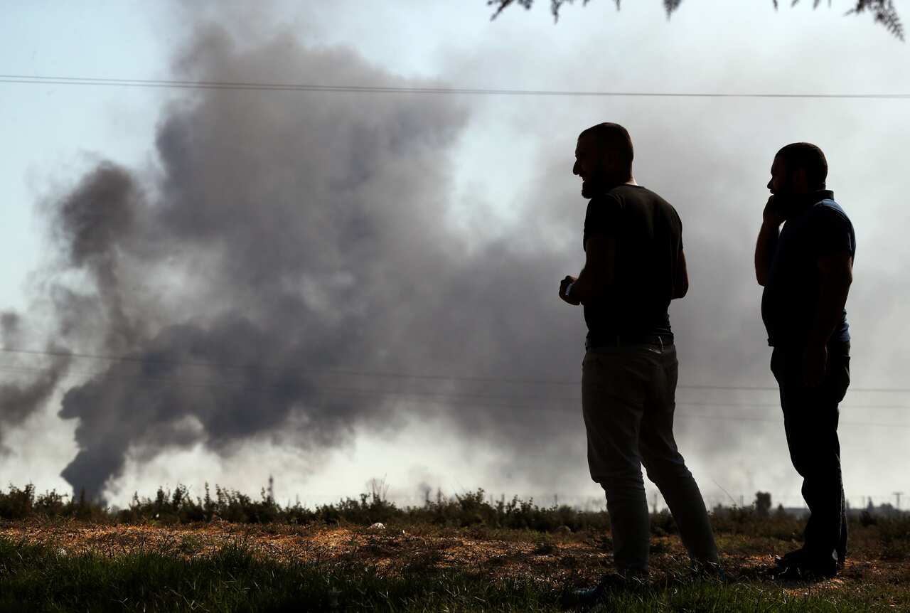 Smoke billows from targets inside Syria on 10 October.