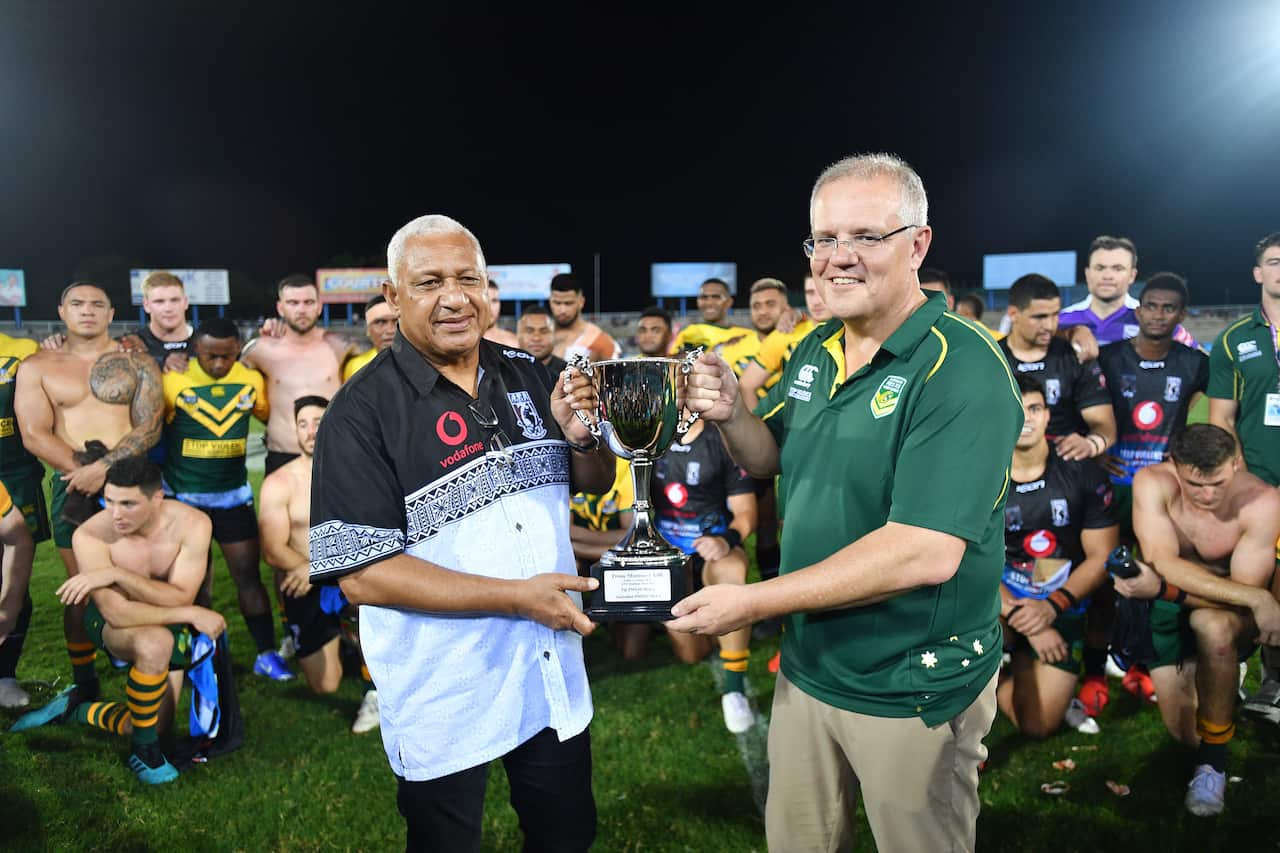 Mr Morrison with Fijian Prime Minister Frank Bainimarama after the NRL Rugby game between Australia and Fiji in Suva.