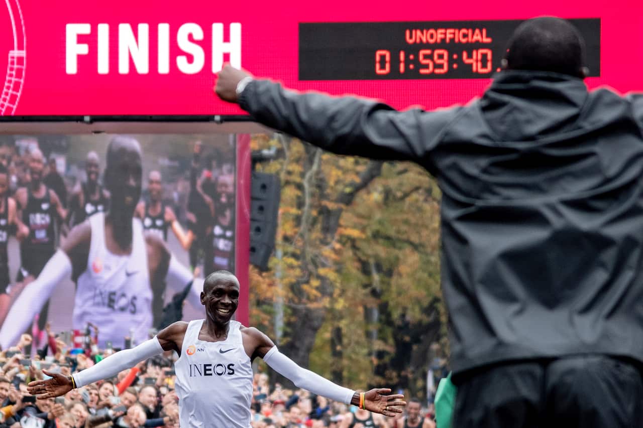 Eliud Kipchoge, Kenyan marathon world record holder, celebrates after the INEOS 1:59 Challenge in Vienna, Austria.