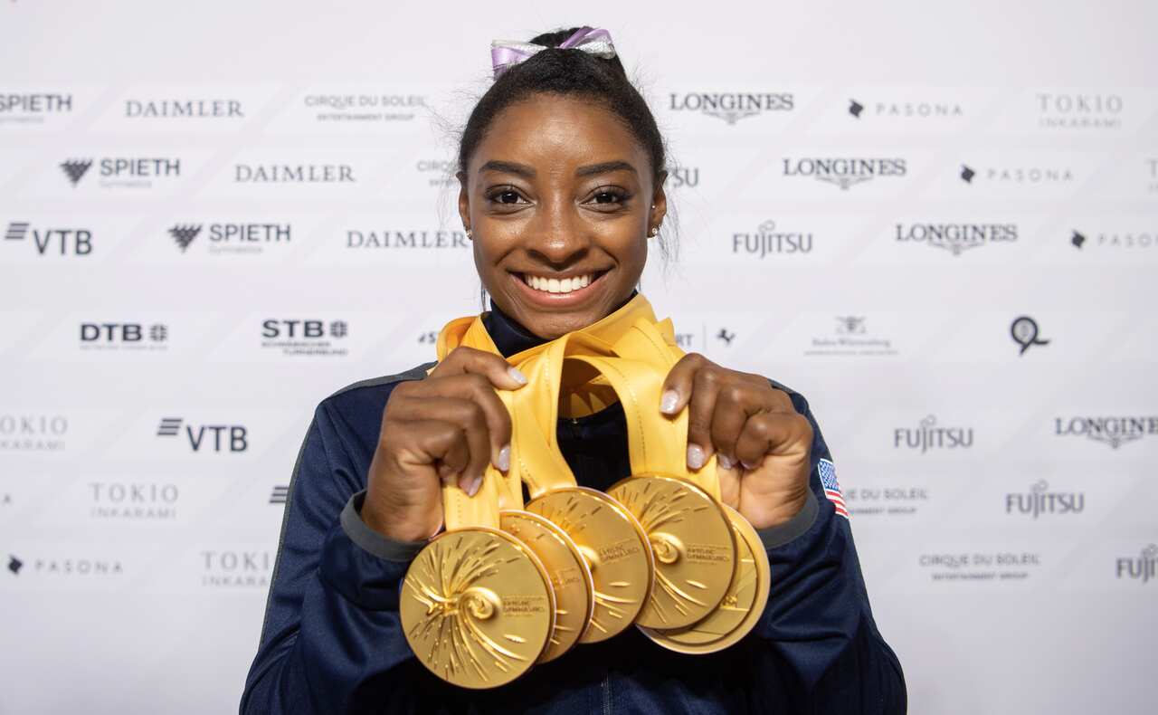 USA's Simone Biles poses with her five gold medal haul at the 2019 World Artistic Gymnastics Championships.