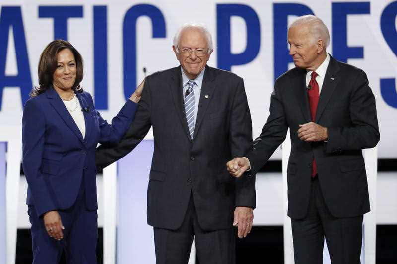 Democratic presidential candidates Kamala Harris, Bernie Sanders, and former Vice President Joe Biden at a Democratic presidential primary debate.