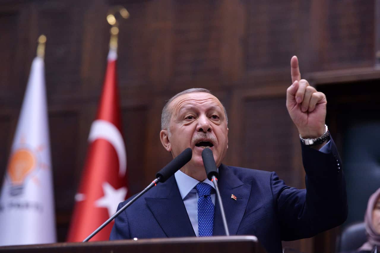 Turkish President Recep Tayyip Erdogan addresses members of ruling Justice and Development Party.