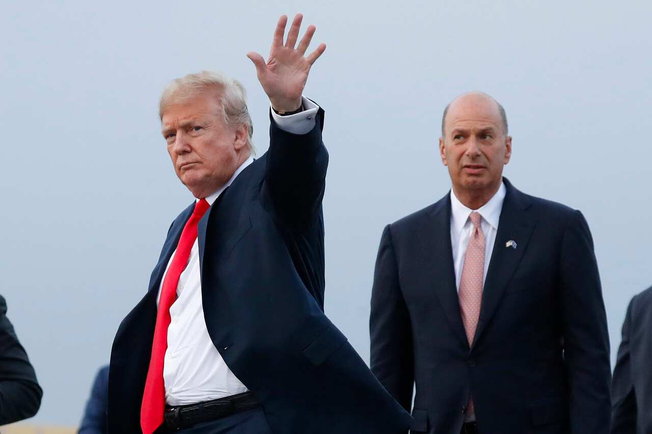 President Donald Trump is joined by Gordon Sondland, the EU ambassador to the EU, as he arrives at Melsbroek Air Base, in Brussels, Belgium in July 2018.